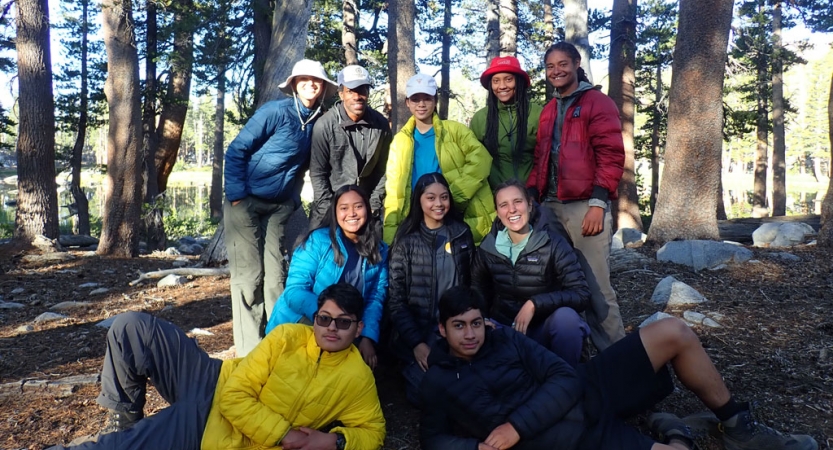 a group of students pose for a photo on a backpacking trip for bipoc teens 
